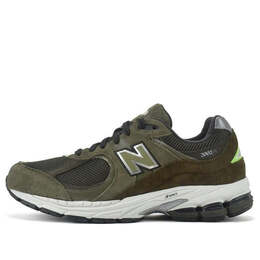 New Balance: Зелёные кроссовки 
