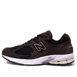 New Balance: Серые кроссовки 