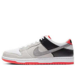 Nike: Серые кроссовки  SB Dunk Low