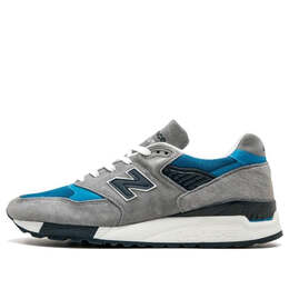 New Balance: Серые кроссовки 