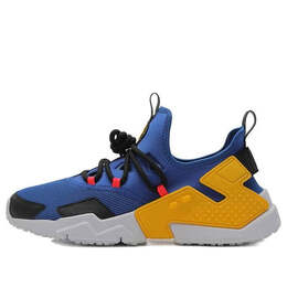 Nike: Жёлтые кроссовки  Air Huarache