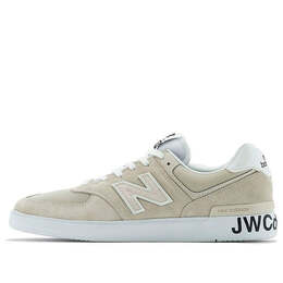 New Balance: Бежевые кроссовки 