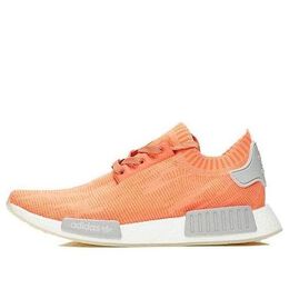 Adidas: Оранжевые кроссовки  NMD_R1 Primeknit