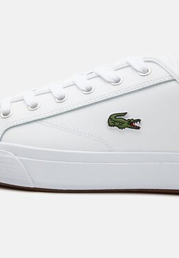 Lacoste: Белые кроссовки 