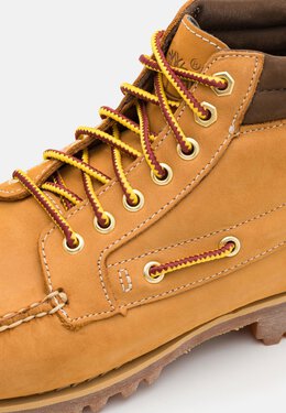 Timberland: Бежевые ботинки 