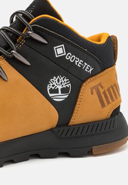 Timberland: Коричневые кроссовки 