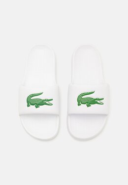 Lacoste: Белые сабо 