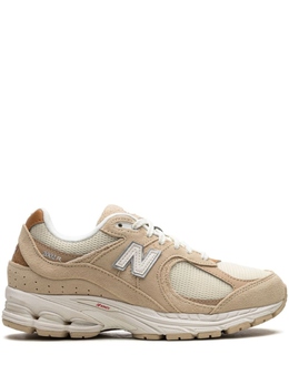 New Balance: Бежевые кроссовки  2002R