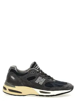 New Balance: Серые кроссовки 