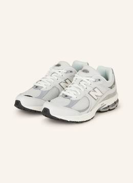 New Balance: Серые кроссовки 