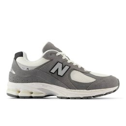 New Balance: Серые кроссовки 