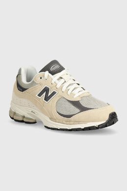 New Balance: Бежевые кроссовки 