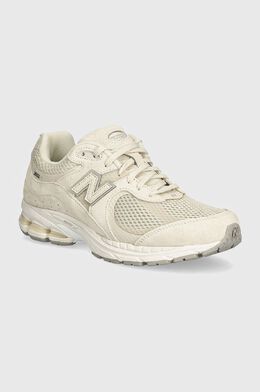 New Balance: Бежевые кроссовки 