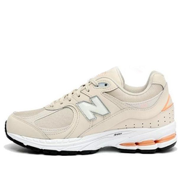 New Balance: Бежевые кроссовки  2002R