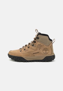 Timberland: Бежевые ботинки 