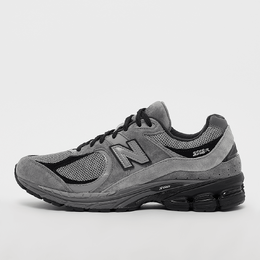 New Balance: Серые кроссовки 
