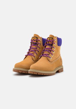 Timberland: Жёлтые ботинки 