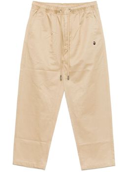 A BATHING APE®: Бежевые брюки 