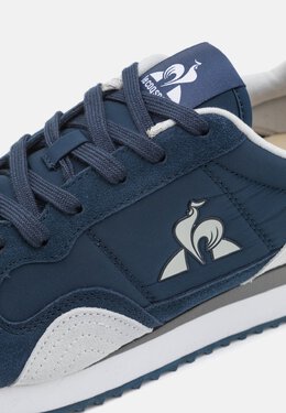 Le Coq Sportif: Тёмные кроссовки 