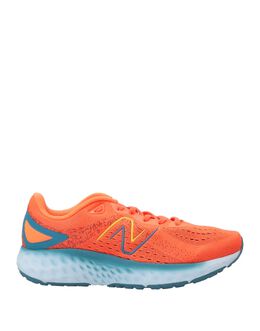 New Balance: Оранжевые кеды 