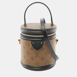 Louis Vuitton: Коричневая сумка 