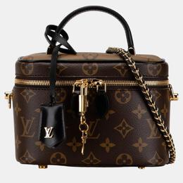 Louis Vuitton: Коричневая сумка 