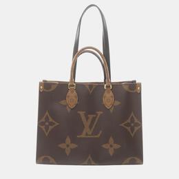 Louis Vuitton: Коричневая сумка-шоппер 