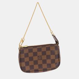 Louis Vuitton: Коричневый клатч  Pochette Accessoires