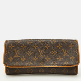 Louis Vuitton: Коричневая сумка  Pochette