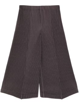 Homme Plissé Issey Miyake: Тёмные брюки 