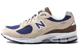 New Balance: Бежевые кроссовки  2002R