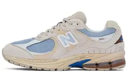 New Balance: Бежевые кроссовки  2002R