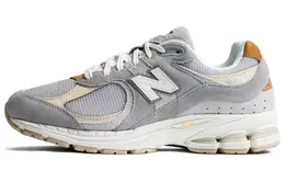 New Balance: Серые кроссовки  2002R
