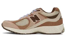 New Balance: Бежевые кроссовки  2002R