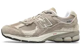 New Balance: Бежевые кроссовки  2002R