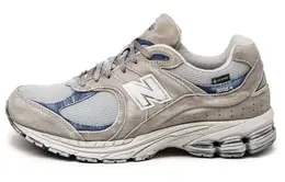 New Balance: Бежевые кроссовки  2002R