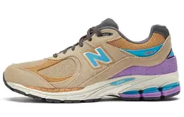 New Balance: Бежевые кроссовки  2002R