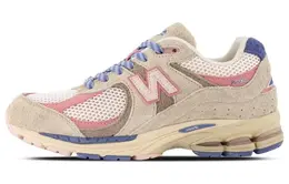 New Balance: Бежевые кроссовки  2002R