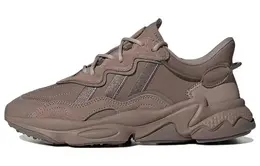 adidas: Коричневые кроссовки  Ozweego