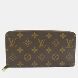 Louis Vuitton: Коричневый кошелёк  Zippy