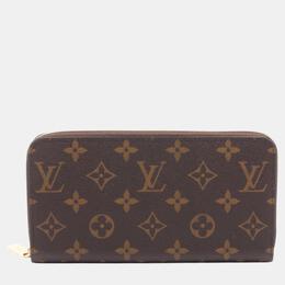 Louis Vuitton: Коричневый кошелёк  Zippy