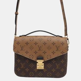 Louis Vuitton: Коричневая сумка  Pochette