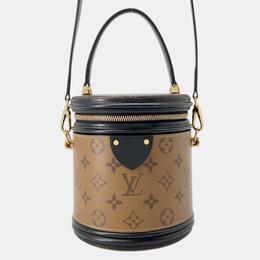 Louis Vuitton: Коричневая сумка 