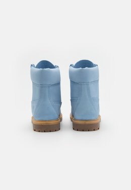 Timberland: Светлые ботинки 