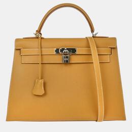 Hermes: Коричневая сумка  Kelly 32