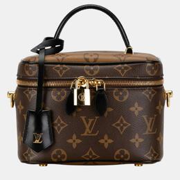 Louis Vuitton: Коричневая сумка 
