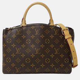 Louis Vuitton: Коричневая сумка 