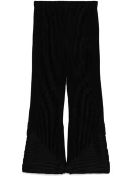 Homme Plissé Issey Miyake: Чёрные брюки 