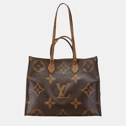 Louis Vuitton: Коричневая сумка 