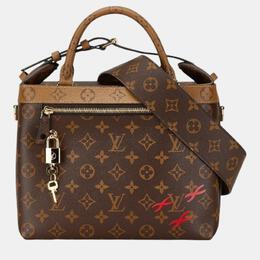 Louis Vuitton: Коричневая сумка 